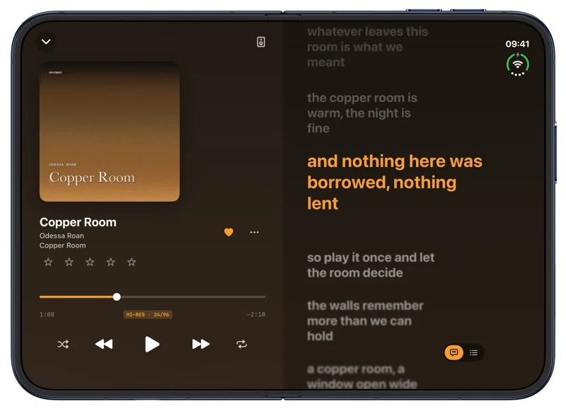NaviBeat on iPhone Duo, half open: cover and controls on the left page, lyrics on the right