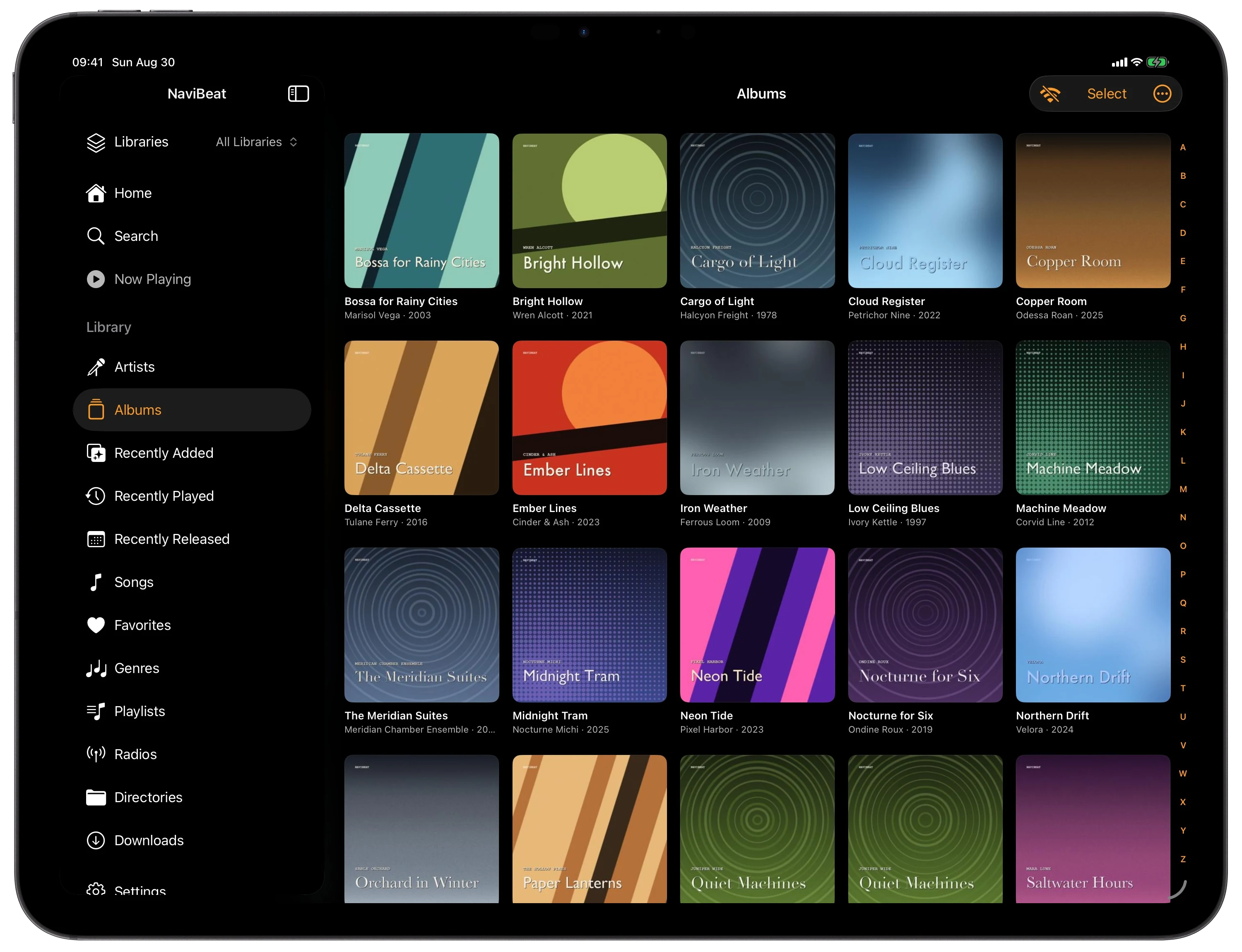 NaviBeat Albums grid on iPad with two rows of cover art and an alphabetical index along the right edge