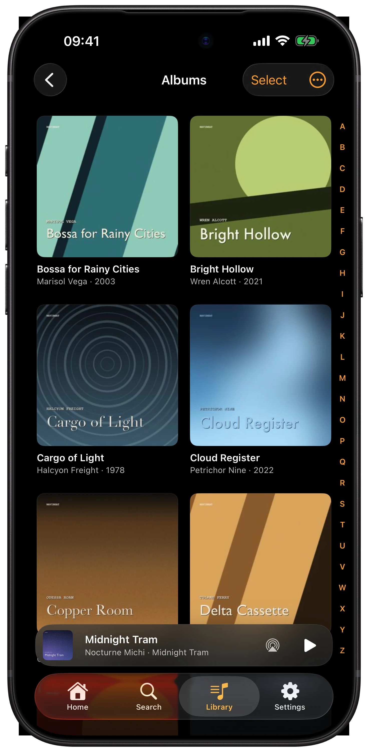 NaviBeat Albums grid on iPhone with two columns of cover art and an alphabetical index along the right edge