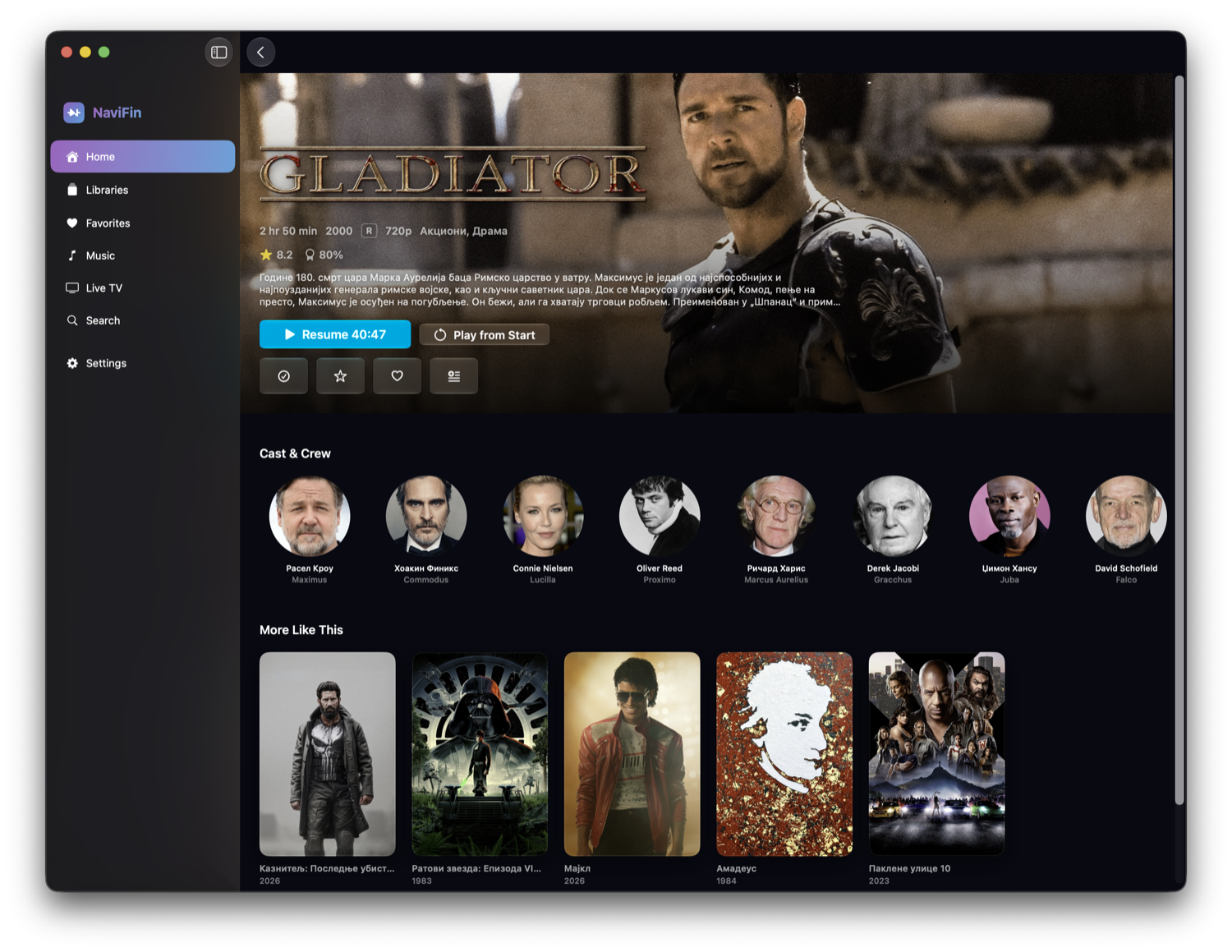 NaviFin movie detail page on Mac, showing a film with cast, ratings, and a resume button