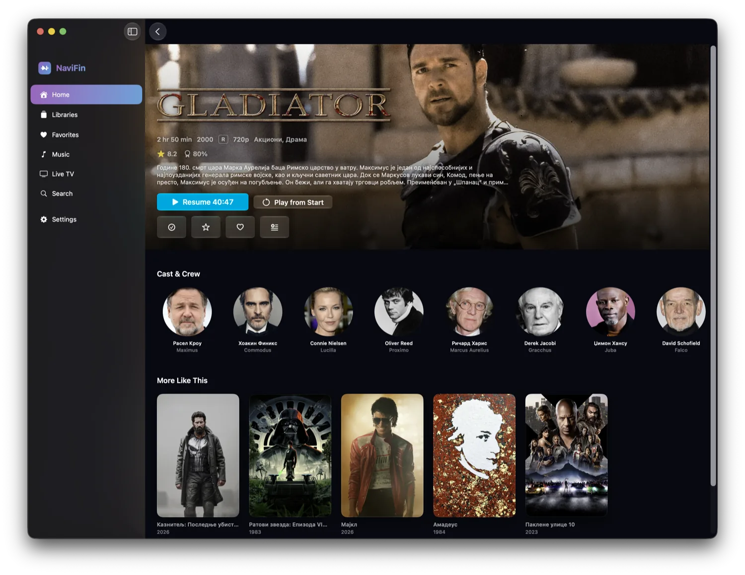 NaviFin movie detail page on Mac, showing a film with cast, ratings, and a resume button