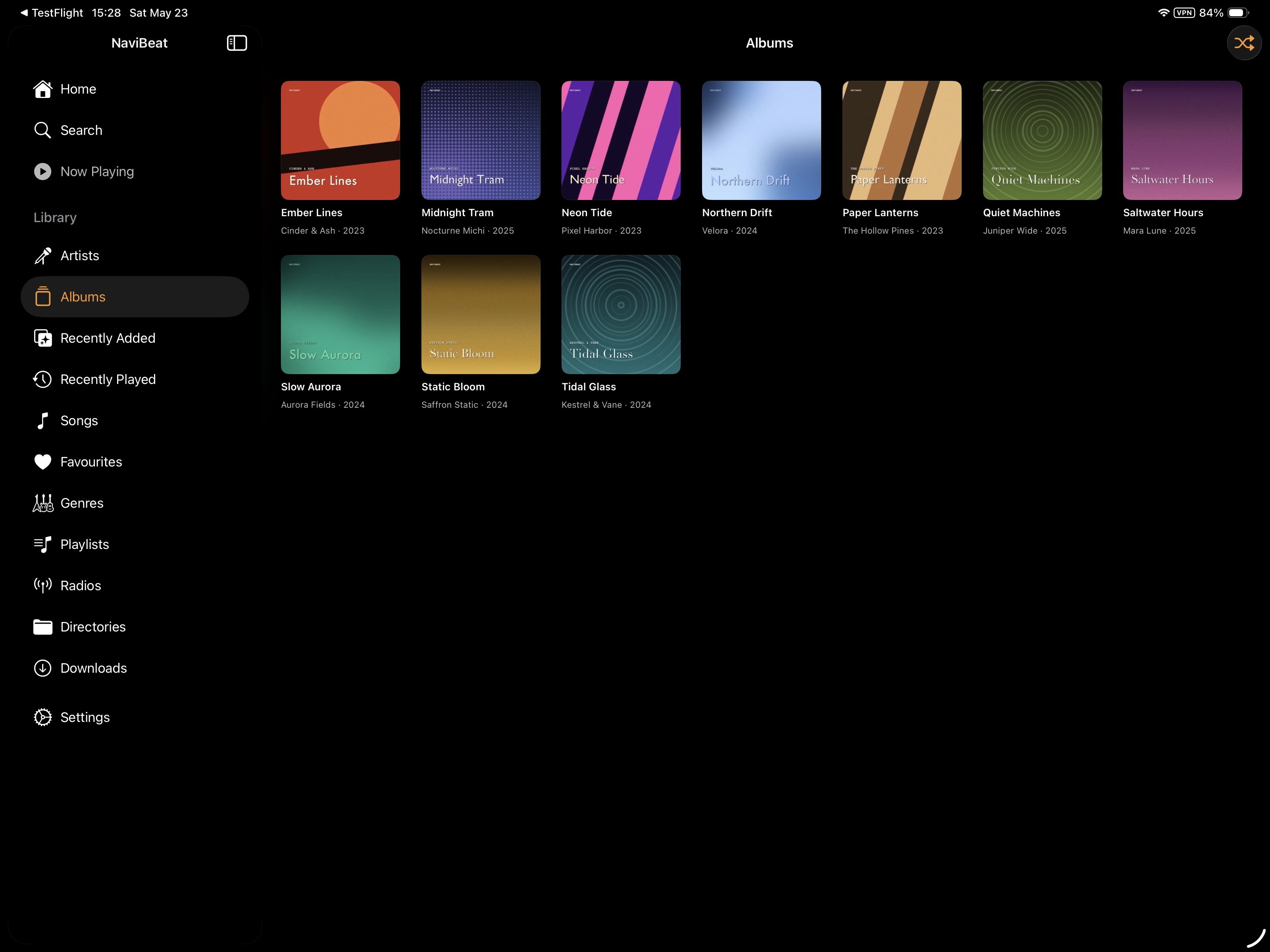 NaviBeat Albums grid on iPad with large cover art and metadata