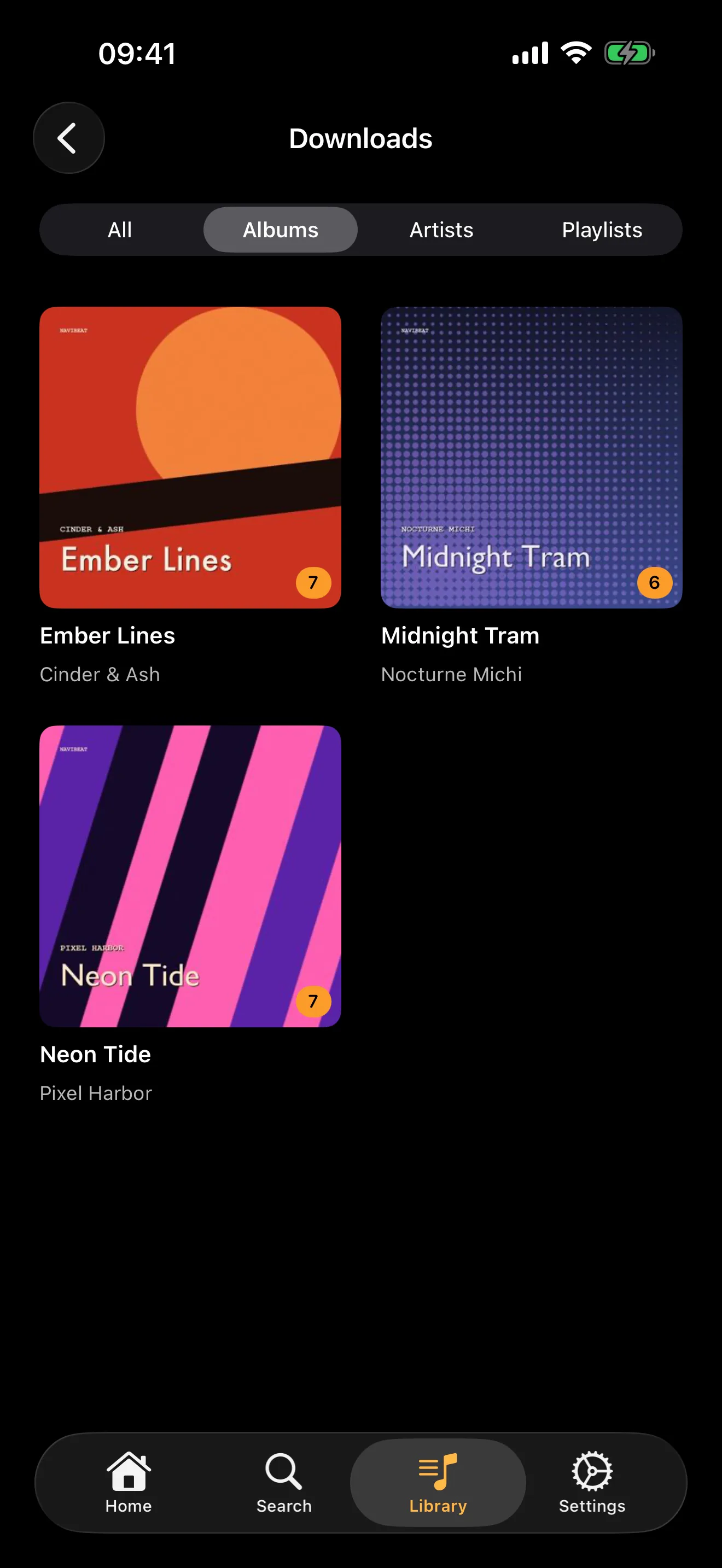 The NaviBeat downloads screen on iPhone listing downloaded albums with track counts