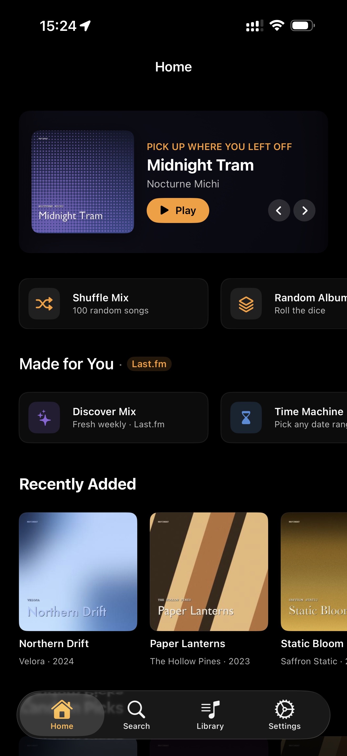 NaviBeat Home on iPhone with tab bar and library browsing