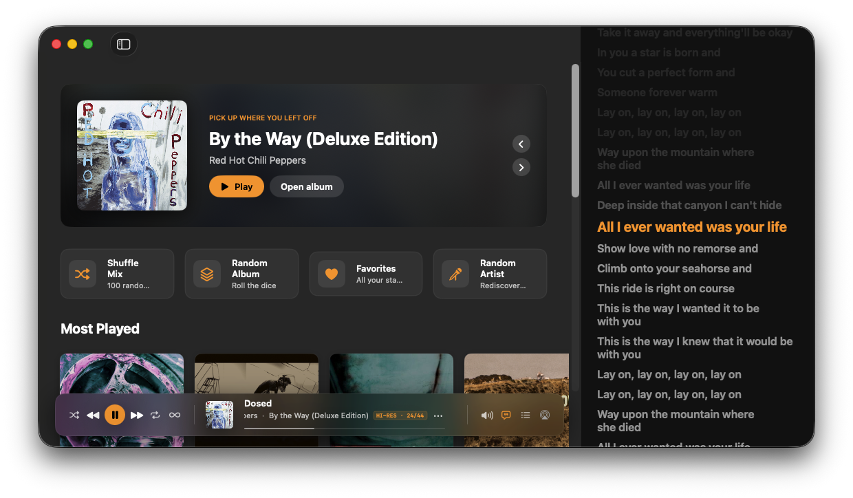 NaviBeat Mac Standard Player with the lyrics panel docked to the right side showing time-synced lyrics for By the Way by Red Hot Chili Peppers, while the main library browser stays visible.