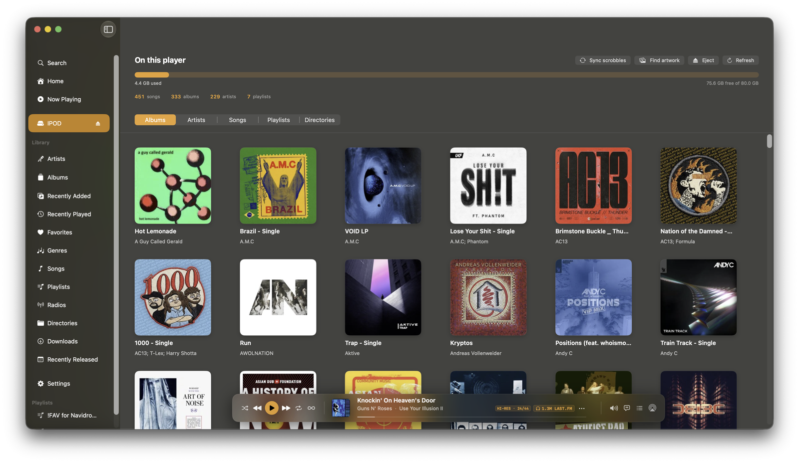 The On this player screen: a grid of album covers for everything on the connected iPod, with a storage bar and song, album, artist and playlist counts.