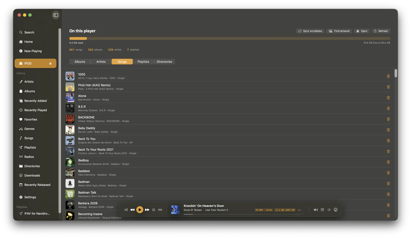 The Songs tab: a list of tracks on the device, each with its album-art thumbnail, title and artist.