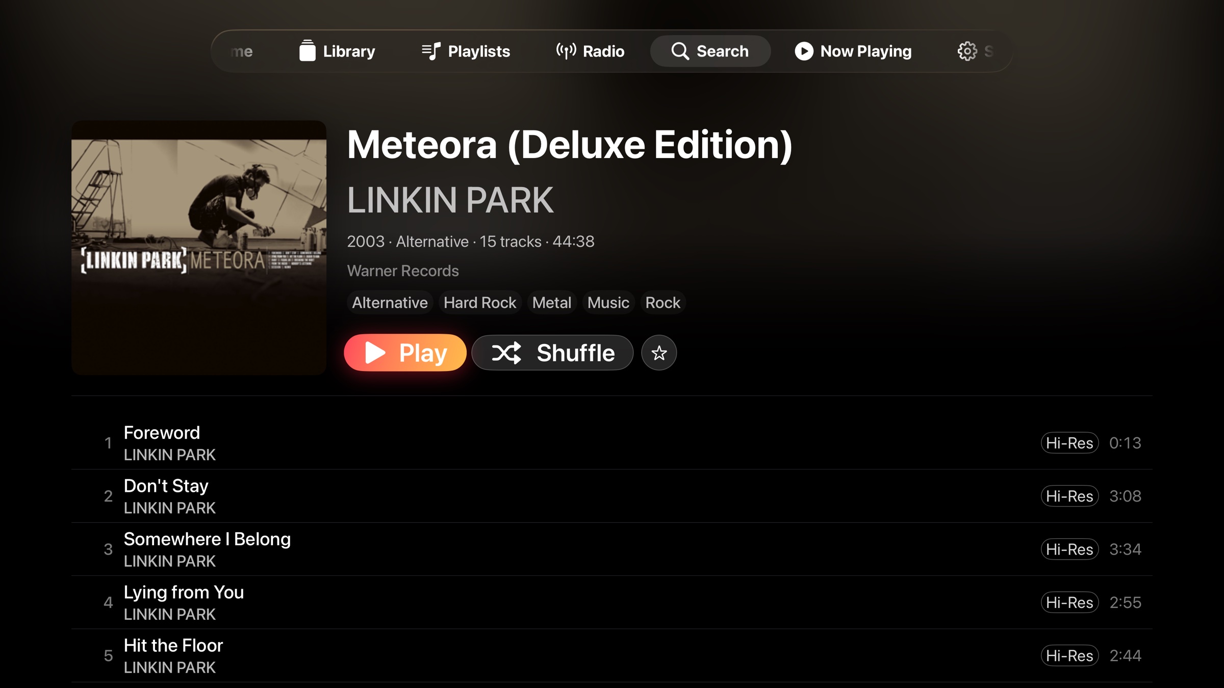 NaviBeat album detail on Apple TV: Linkin Park Meteora with track list, Hi-Res badges, Play, Shuffle, and Favorite buttons.
