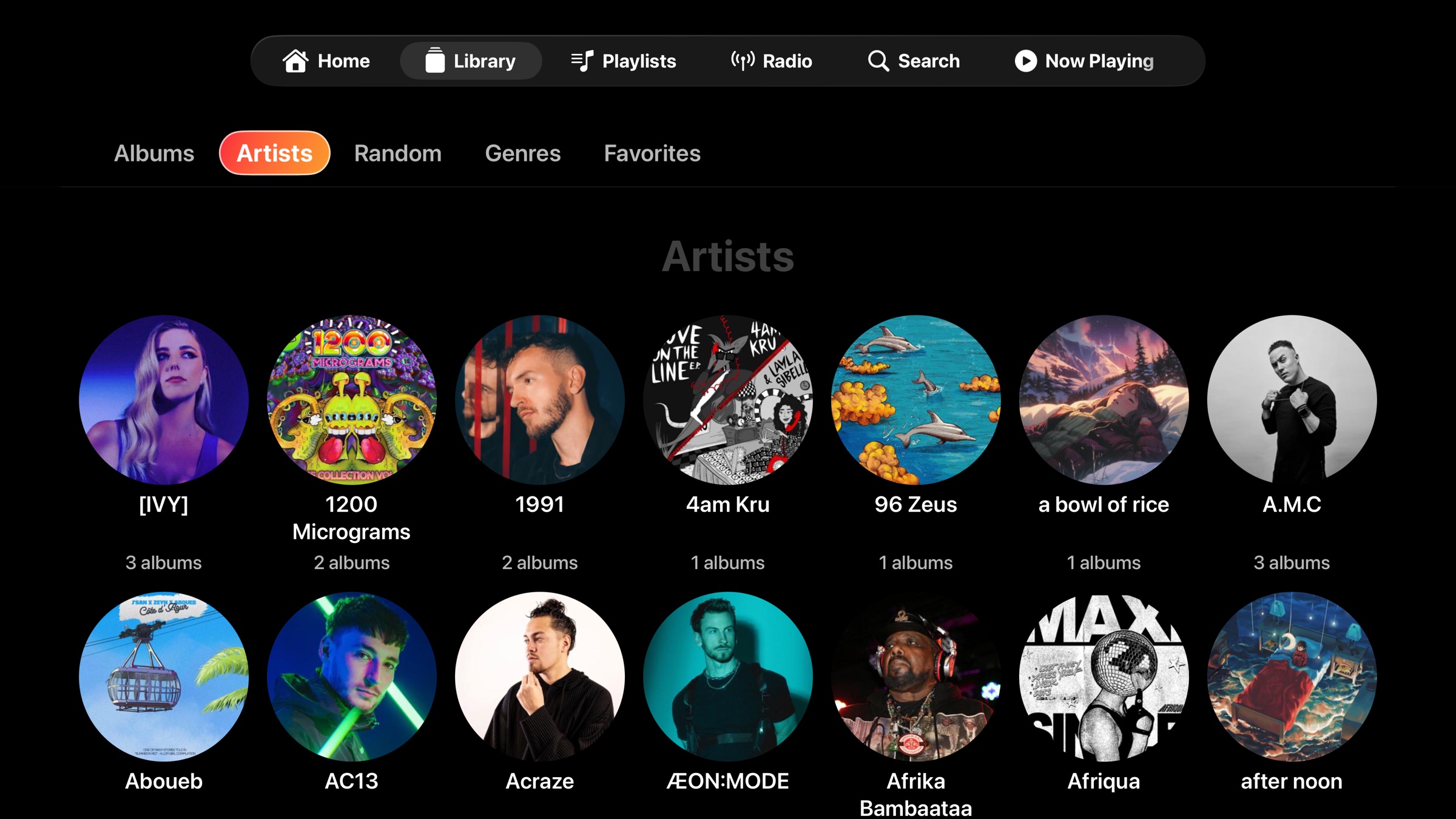 NaviBeat Artists view on Apple TV with circular portraits, album counts, and alphabetized sort &mdash; pulled from a Navidrome server.