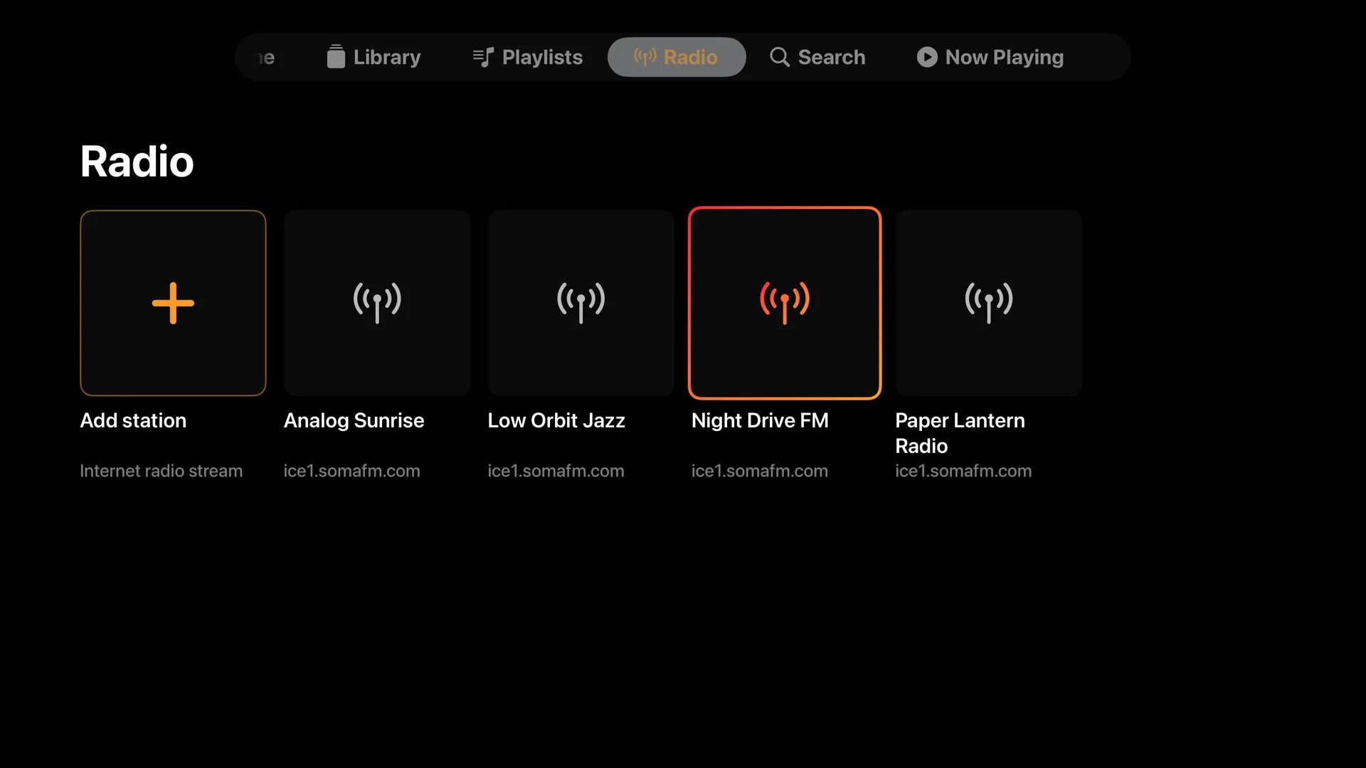 NaviBeat Internet Radio on Apple TV with a list of station tiles.
