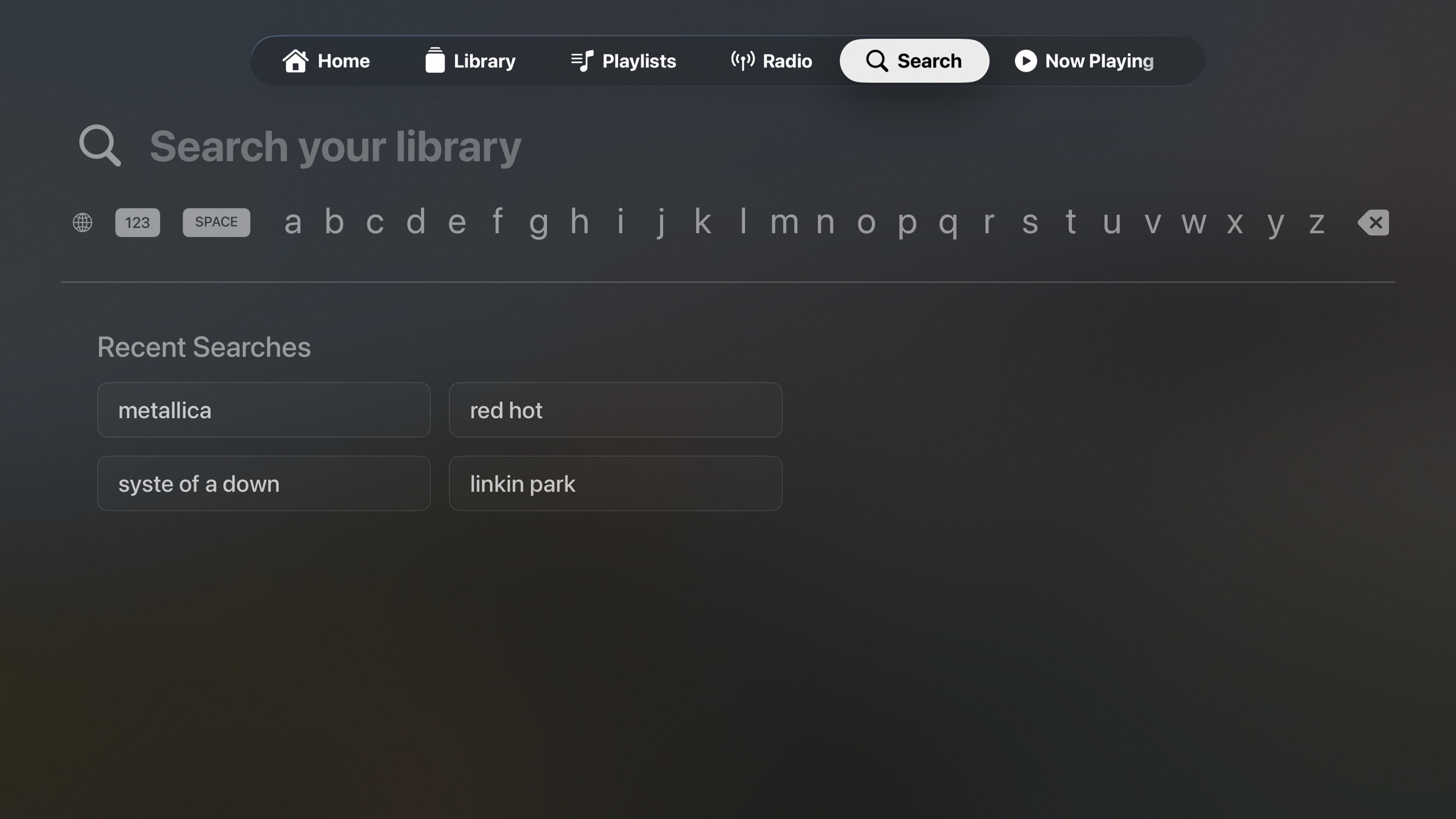 NaviBeat Search on Apple TV: on-screen letter picker (A-Z) with Recent Searches showing metallica, red hot, syste of a down, linkin park.